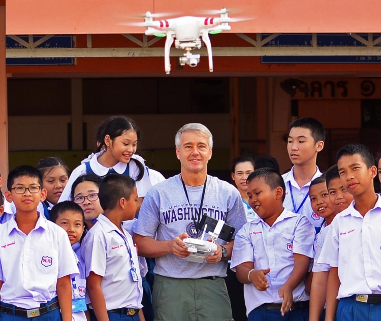 Dr. Randy Kyes conducts field course while operating a drone in Thailand.